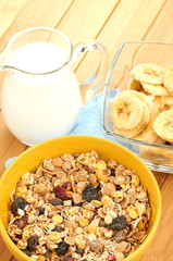 Delicious and healthy cereal in bowl with milk