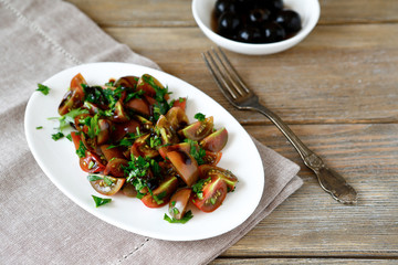 Fresh salad with vegetables in a plate