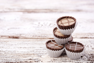 Dark chocolate on wooden background