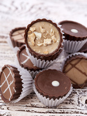 Dark chocolate on wooden background