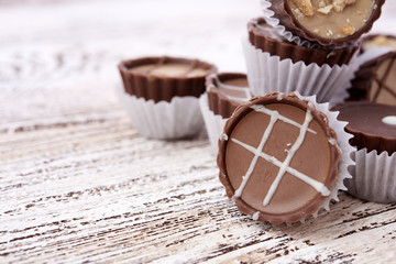 Dark chocolate on wooden background