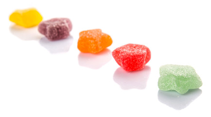 Colorful sugar jelly candy over white background