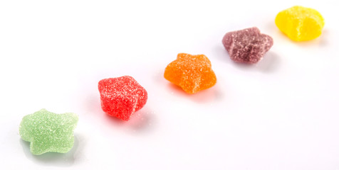 Fototapeta na wymiar Colorful sugar jelly candy over white background