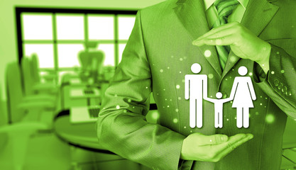 businessman protecting family Insurance concept