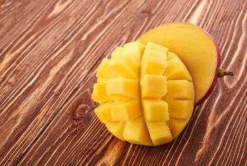 Mango fruit on wood