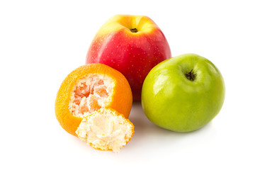 Peeled tangerine or mandarin fruit, and apples isolated