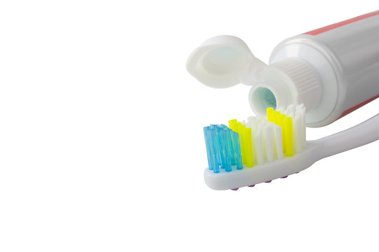 A toothbrush with toothpaste on isolated