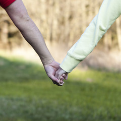 boy and girl holding hands