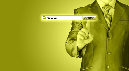 Businessman pushing virtual search bar