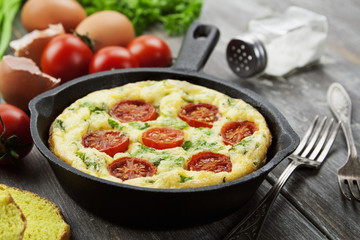 Omelet with vegetables and cheese. Frittata