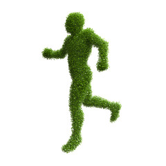 Silhouette of a man running from green leaves