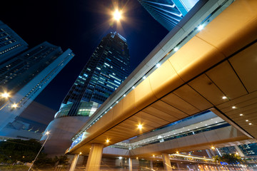 Fototapeta na wymiar City night scene with business office skyscrapers in Hong Kong,