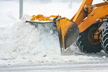 Clearing snow after a storm - 77365567