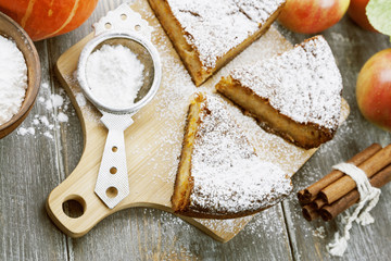 Pumpkin pie with apples and cinnamon