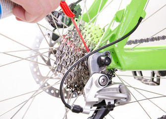 Obraz premium bicycle repair bicycle , derailleur adjustment
