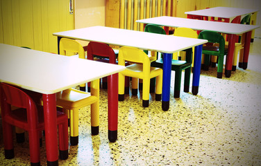 small benches and small colored chairs
