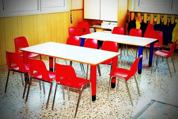 classroom nursery with chairs and desks