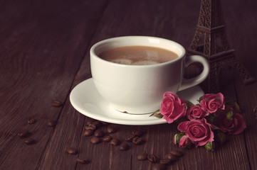 coffee with coffee beans and roses