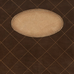 Leather label on background