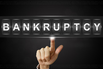 business hand clicking bankruptcy on Flipboard