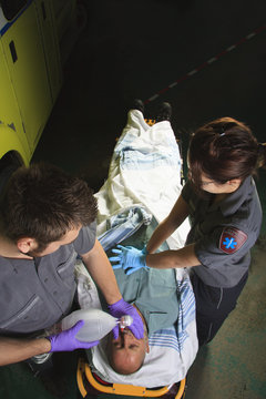 Paramedic who make a cardio-pulmonary resuscitation to a person