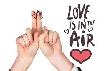 Composite image of fingers crossed like a couple