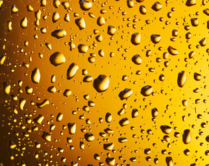 Water drops on a beer glass.