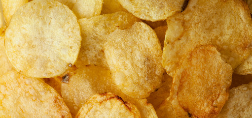 Delicious potato chips closeup