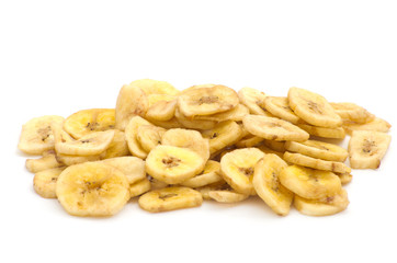 a pile of banana chips on white background
