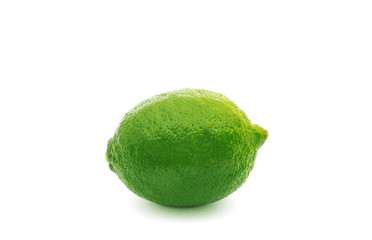 Limes with slices and leaves isolated on white background