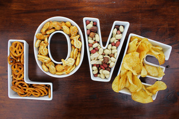Love snacks Snacks in Love letter bowls on dark wood