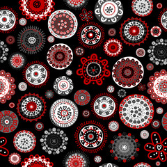 Seamless with doodle flowers over black background