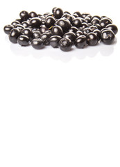 Blaeberry also known as bilberry over white background