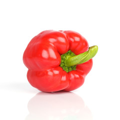 ripe red bell pepper on white background