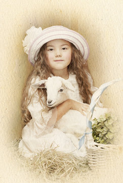 Child posing with her pet goat