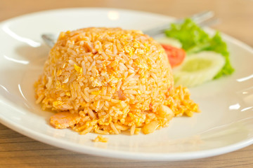 Fried rice on a plate placed on the table