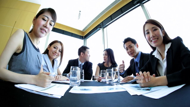 Asian Chinese Business Team Meeting via Video Uplink 