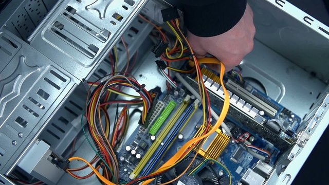 Top view of removing cables from motherboard