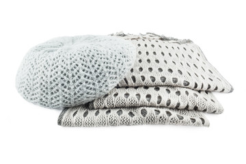 Woolen scarf and cap isolated on white background