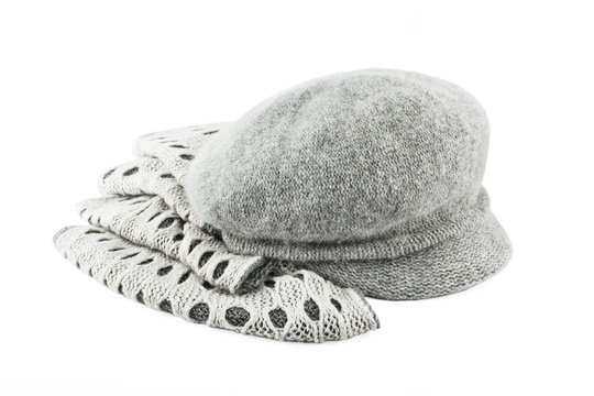 Woolen scarf and cap isolated on white background