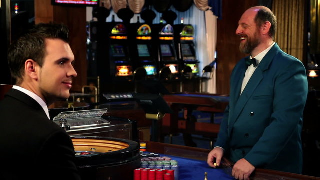 Playing roulette in casino