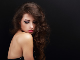 Fototapeta premium Beautiful long hair makeup woman looking down