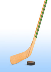 Ice hockey stick and puck