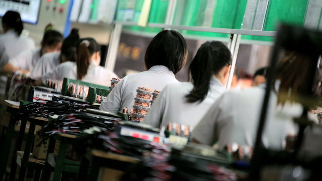 People working in modern factory, China, Asia
