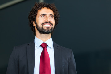 Handsome smiling business man portrait