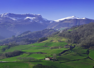 Fototapeta na wymiar Meadows, farm, mountain snow, municipality of Elizmendi, Euskadi