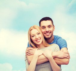 Fototapeta premium smiling couple hugging