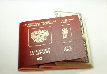 Russian Passport And Dollars USA Isolated On White Background