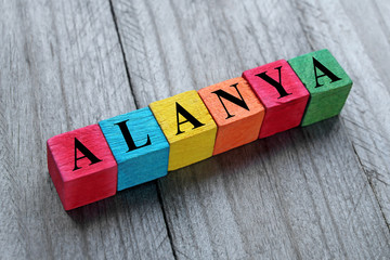 word Alanya on colorful wooden cubes