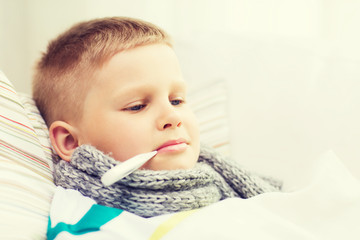 ill boy with flu at home